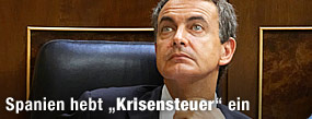Von Krisen- zu Defizitbek&auml;mpfung / &copy;Bild: AP/Paul White